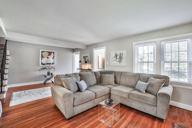 35 University Ct, Amherst, NY 14226 - living area featuring baseboards and dark wood-style floors