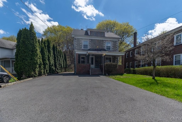 503 Woods Rd, Geddes, NY 13209 - american foursquare style home with a porch and a front yard