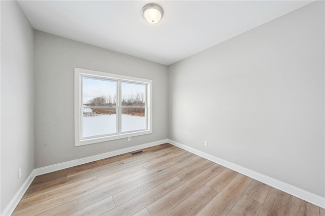 2 Stella Ln, Ogden, NY 14559 - spare room featuring light wood-type flooring and baseboards