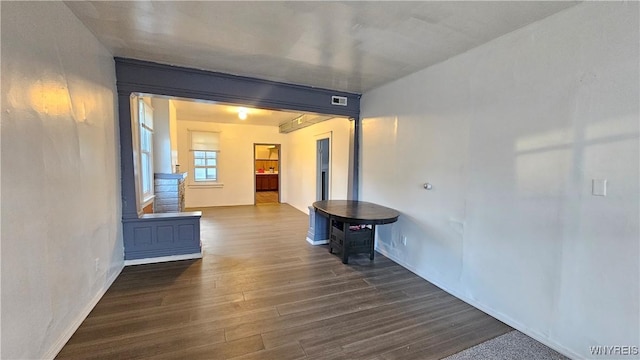 86 Roehrer Ave, Buffalo, NY 14208 - hallway with dark wood finished floors, visible vents, and baseboards