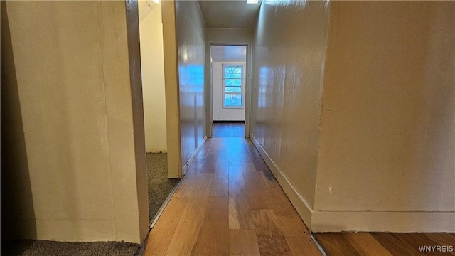 86 Roehrer Ave, Buffalo, NY 14208 - hall with baseboards and wood finished floors