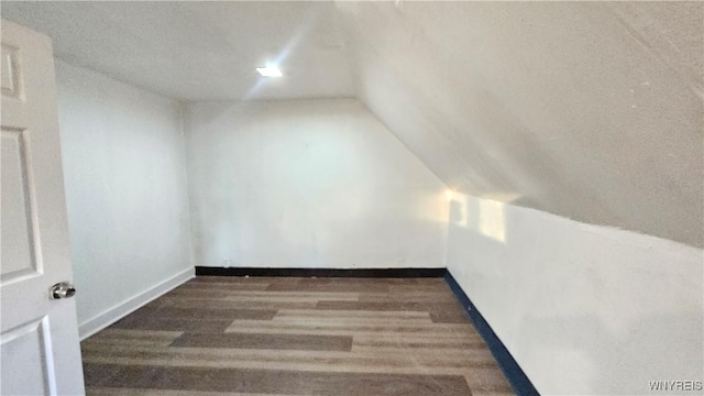 86 Roehrer Ave, Buffalo, NY 14208 - bonus room featuring baseboards, vaulted ceiling, wood finished floors, and recessed lighting