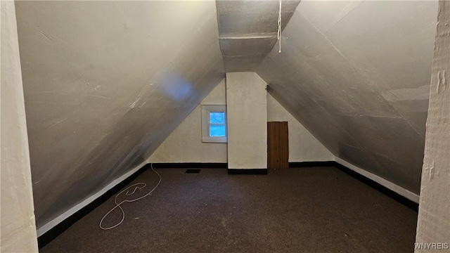 86 Roehrer Ave, Buffalo, NY 14208 - bonus room with vaulted ceiling, visible vents, carpet flooring, and baseboards