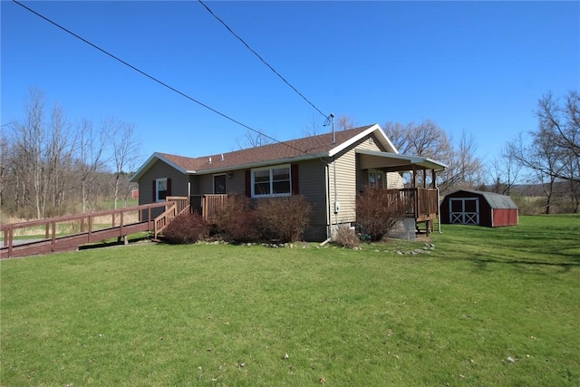 view of side of property featuring an outdoor structure, a storage shed, a yard, and a deck