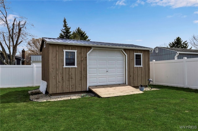 garage featuring fence