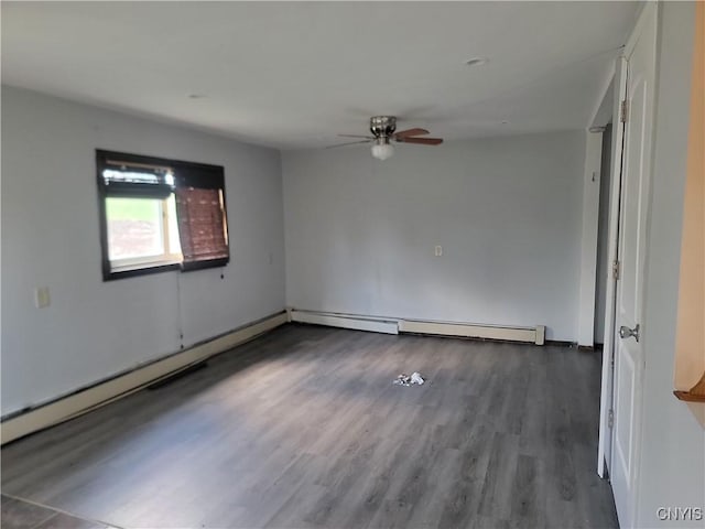 empty room with baseboard heating, wood finished floors, and ceiling fan