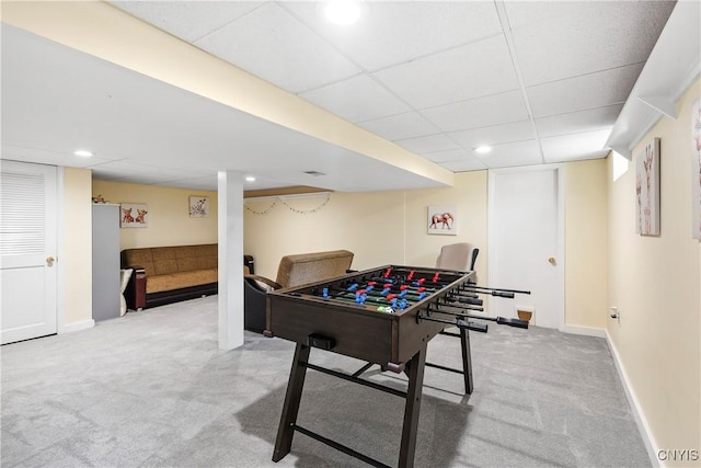 game room featuring baseboards, carpet flooring, a drop ceiling, and recessed lighting