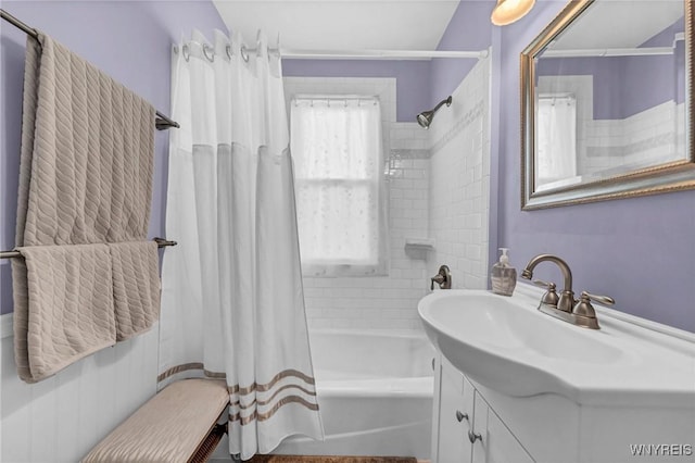 full bathroom with shower / bath combo with shower curtain and vanity
