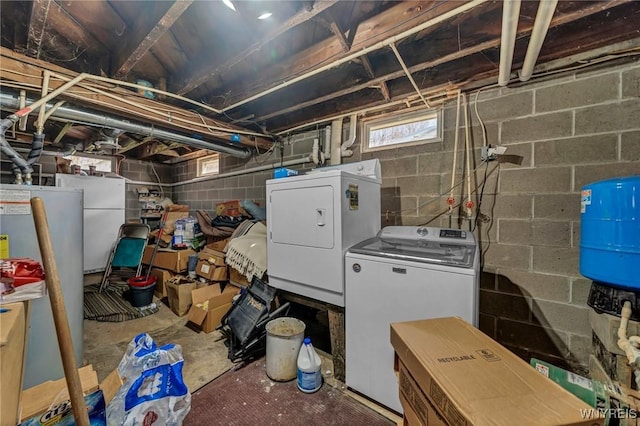 basement with separate washer and dryer and gas water heater