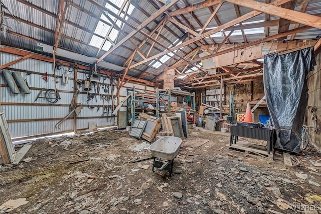 miscellaneous room with lofted ceiling