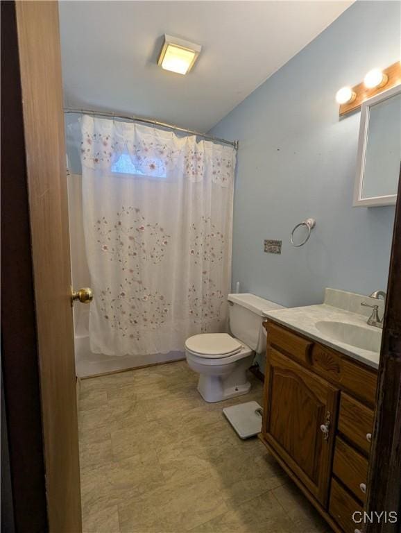 full bath featuring toilet and vanity