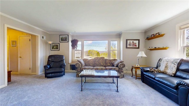 living area featuring light carpet, baseboards, visible vents, and crown molding