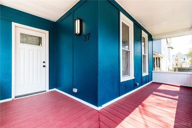 entrance to property with covered porch