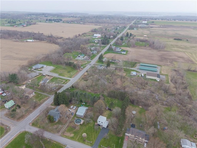 birds eye view of property featuring a rural view