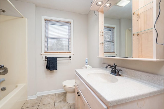 full bath with tile patterned flooring, toilet, vanity, baseboards, and  shower combination