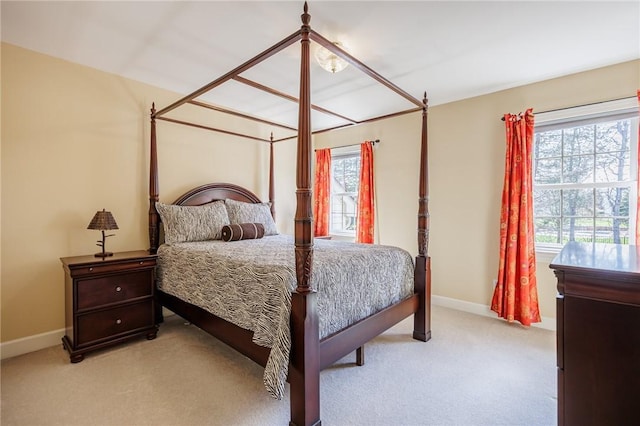 5 Ponds Edge Way, Pittsford, NY 14534 - bedroom featuring light colored carpet, baseboards, and multiple windows