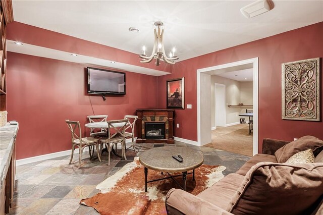 5 Ponds Edge Way, Pittsford, NY 14534 - living area with a chandelier, stone tile floors, and baseboards