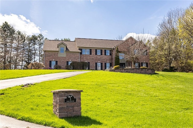 5 Ponds Edge Way, Pittsford, NY 14534 - view of front of property featuring brick siding and a front yard