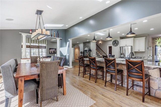 5 Ponds Edge Way, Pittsford, NY 14534 - dining space with stairway, recessed lighting, light wood-style floors, and plenty of natural light