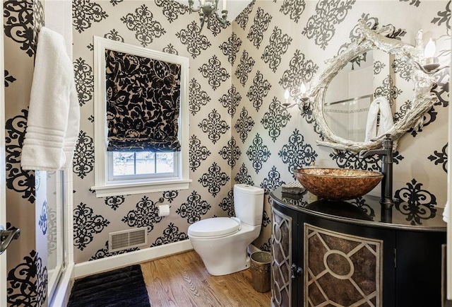 5 Ponds Edge Way, Pittsford, NY 14534 - full bath featuring wallpapered walls, wood finished floors, visible vents, toilet, and baseboards