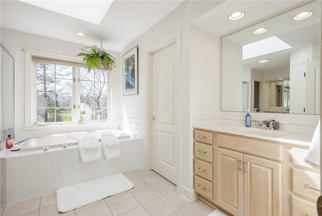5 Ponds Edge Way, Pittsford, NY 14534 - bathroom with a bath, recessed lighting, a skylight, tile patterned flooring, and vanity