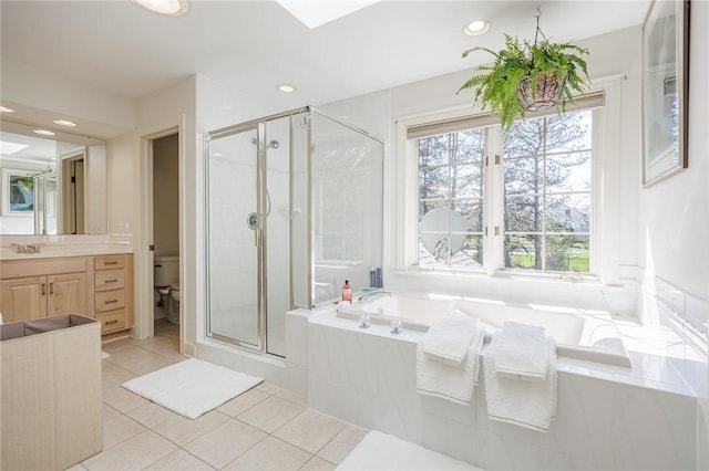 5 Ponds Edge Way, Pittsford, NY 14534 - bathroom featuring a bath, tile patterned floors, toilet, a stall shower, and vanity