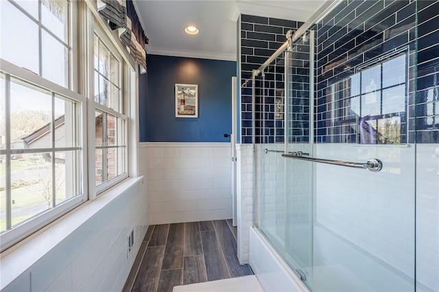 5 Ponds Edge Way, Pittsford, NY 14534 - full bath with wood finished floors, visible vents, ornamental molding, tile walls, and wainscoting