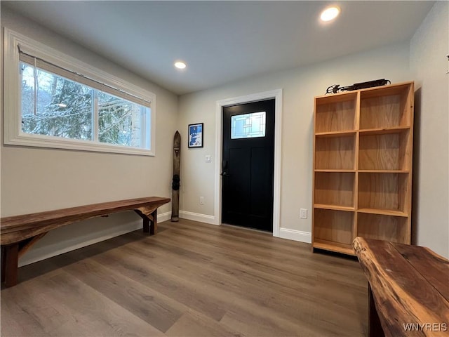 entryway featuring plenty of natural light, wood finished floors, baseboards, and recessed lighting