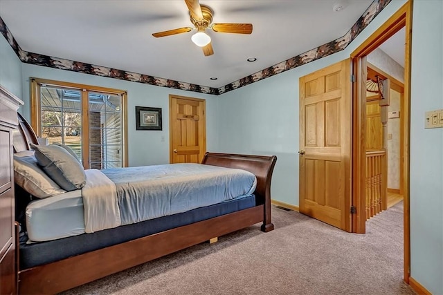 bedroom featuring carpet, ceiling fan, visible vents, baseboards, and access to outside