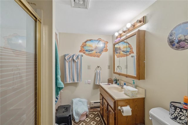 19 Whig Hill Rd, West Monroe, NY 13167 - bathroom featuring a baseboard heating unit, vanity, toilet, and a shower with shower door