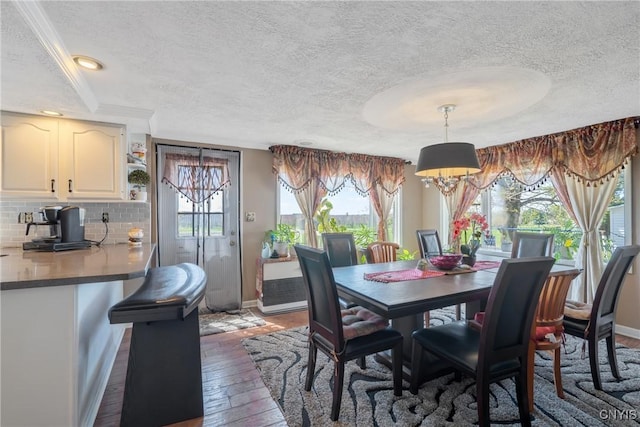 19 Whig Hill Rd, West Monroe, NY 13167 - dining area featuring a textured ceiling, hardwood / wood-style flooring, and baseboards