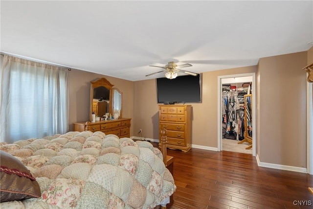 19 Whig Hill Rd, West Monroe, NY 13167 - bedroom featuring baseboards, a walk in closet, dark wood-type flooring, a closet, and a ceiling fan