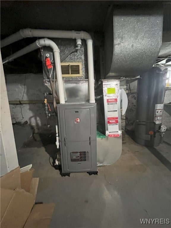 utility room with gas water heater