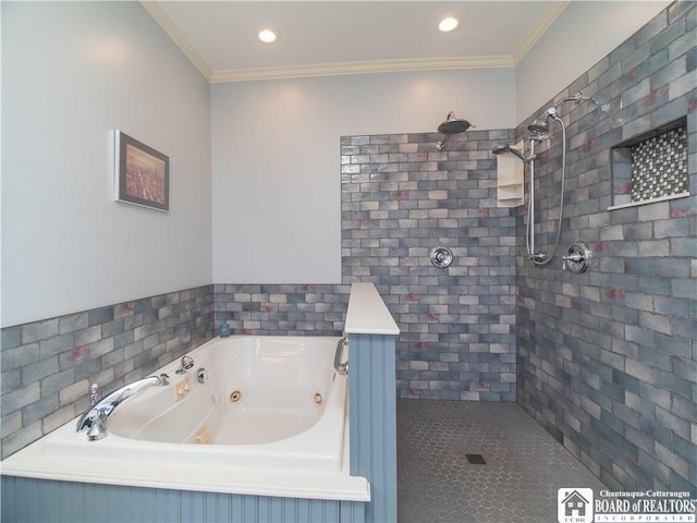 bathroom featuring ornamental molding, a tub with jets, and tiled shower