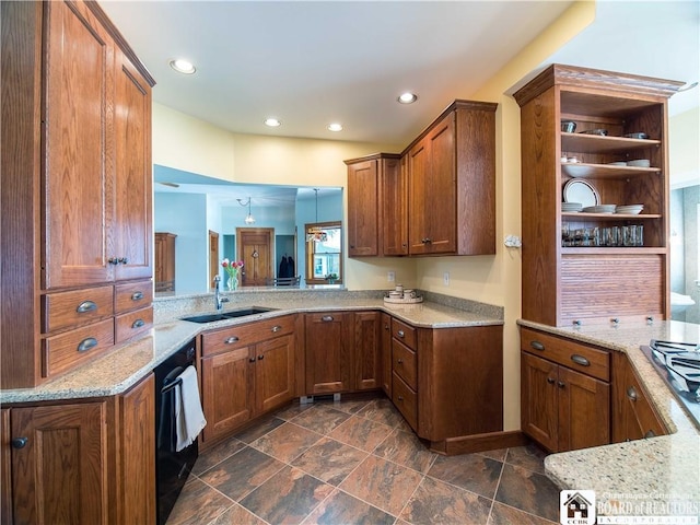 kitchen featuring brown cabinetry, open shelves, a sink, and recessed lighting