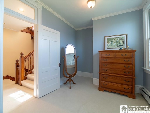 bedroom with baseboard heating, baseboards, carpet, and crown molding