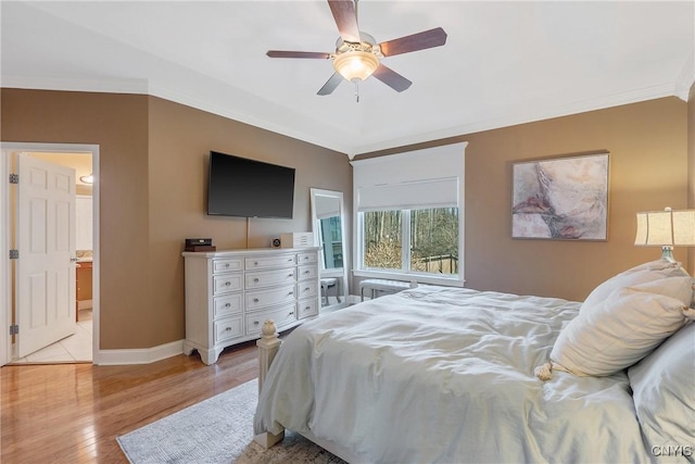6455 Electric Railway, Cicero, NY 13039 - bedroom featuring ceiling fan, baseboards, ornamental molding, and light wood-type flooring