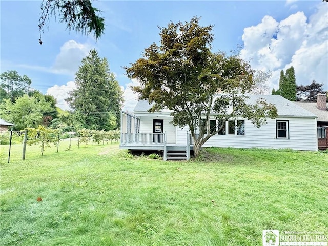 view of yard featuring a deck