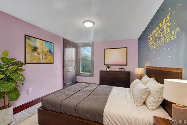 269 S Main St, Wellsville, NY 14895 - bedroom featuring baseboards