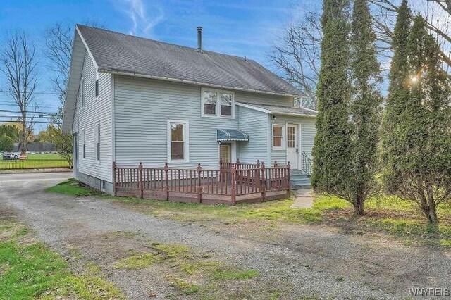 269 S Main St, Wellsville, NY 14895 - rear view of house with a deck