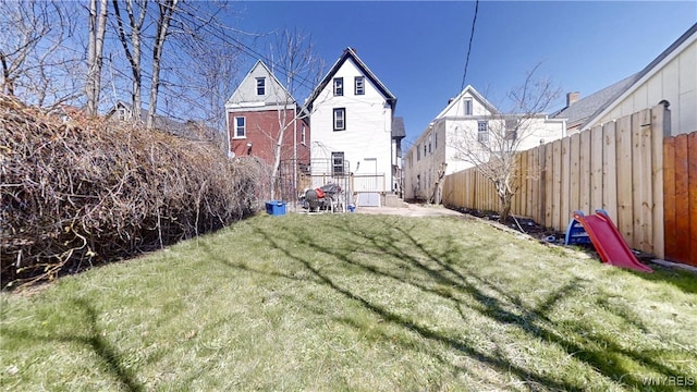 view of yard with a fenced backyard