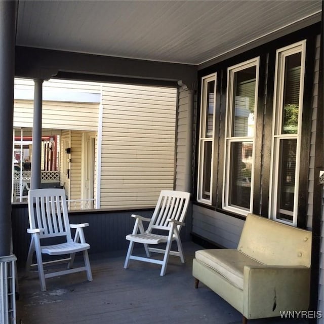wooden deck featuring a porch