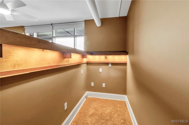 132 Lakefront Blvd Unit 504, Buffalo, NY 14202 - interior space featuring baseboards, a ceiling fan, and carpet flooring