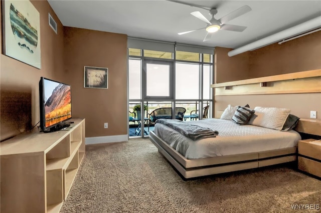 132 Lakefront Blvd Unit 504, Buffalo, NY 14202 - bedroom with expansive windows, carpet floors, visible vents, and baseboards