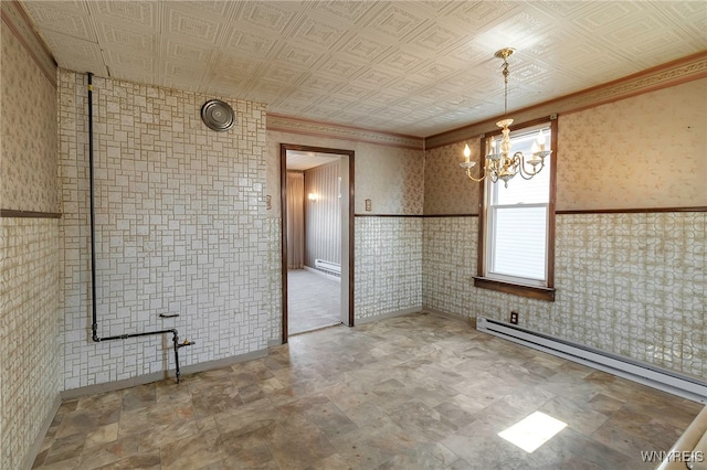 unfurnished dining area featuring a baseboard heating unit, an inviting chandelier, and wallpapered walls