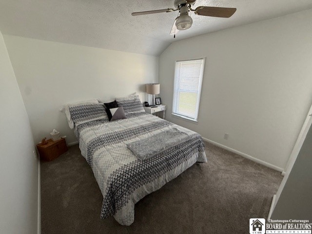 bedroom featuring a textured ceiling, baseboards, carpet, lofted ceiling, and ceiling fan