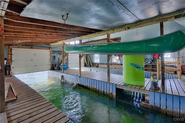 view of dock featuring boat lift