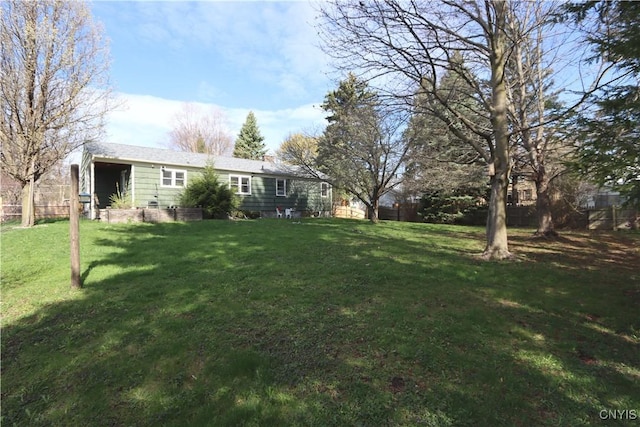 view of yard featuring fence