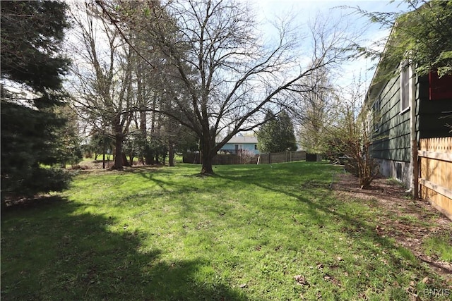 view of yard with fence