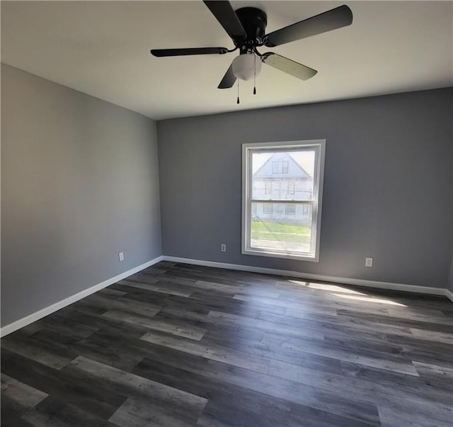 309 Broadway St, Elmira City, NY 14904 - spare room featuring a ceiling fan, baseboards, and dark wood finished floors